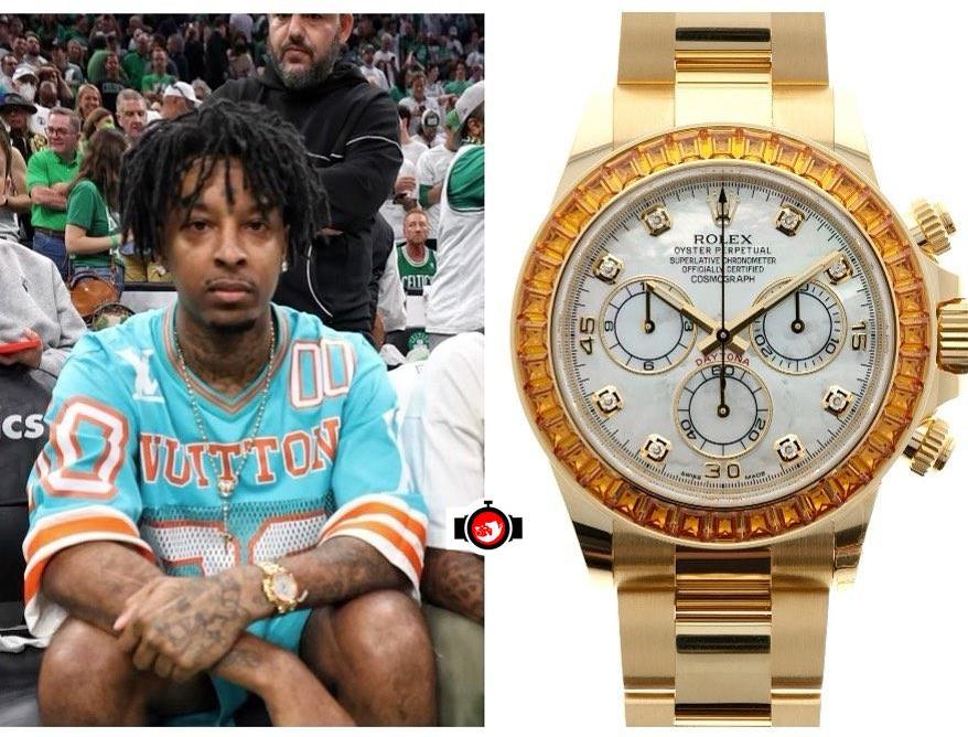 rapper 21 Savage spotted wearing a Rolex 116578SACO