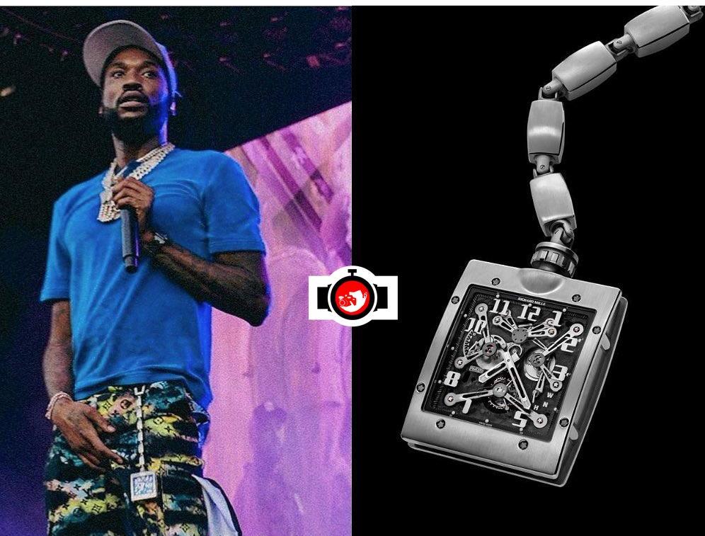 Meek Mill showing off his new $180,000 Richard Mille watch