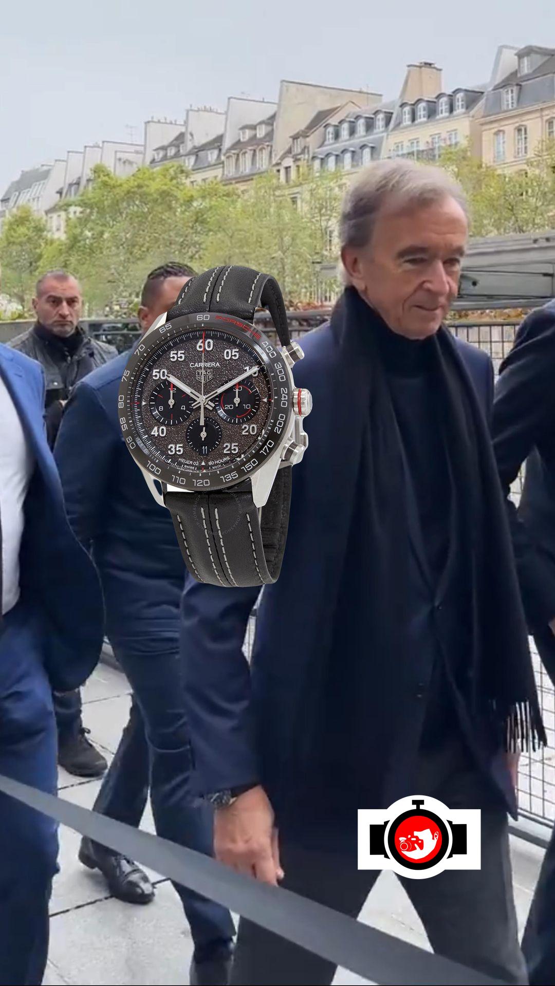 business man Bernard Arnault spotted wearing a Tag Heuer CBN2A1F.FC6492