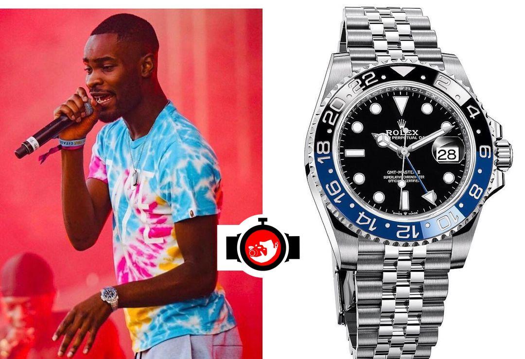 rapper Dave spotted wearing a Rolex 126710BLNR