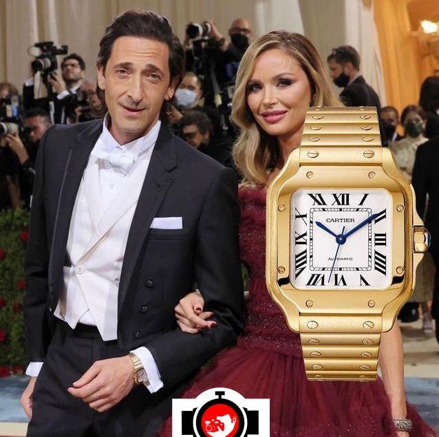 Actor Adrien Brody's Watch Collection: A Look at his Yellow Gold Cartier Santos