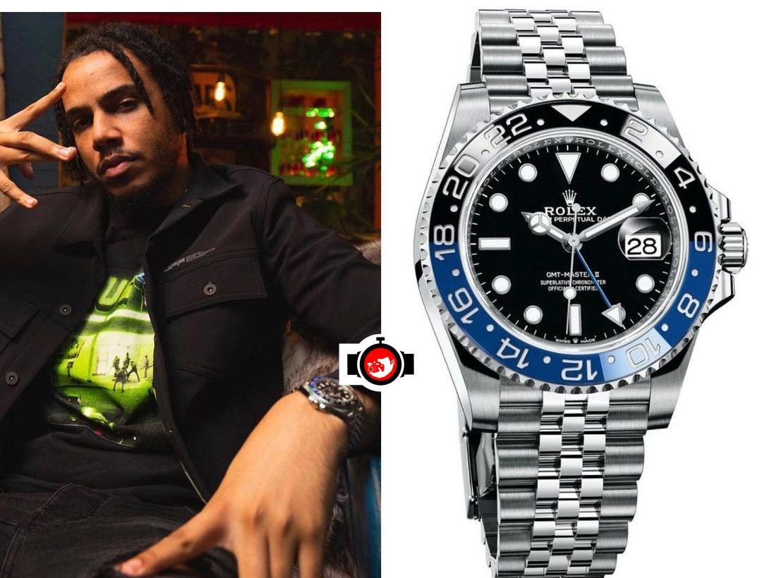 rapper Aj Tracey spotted wearing a Rolex 126710BLNR